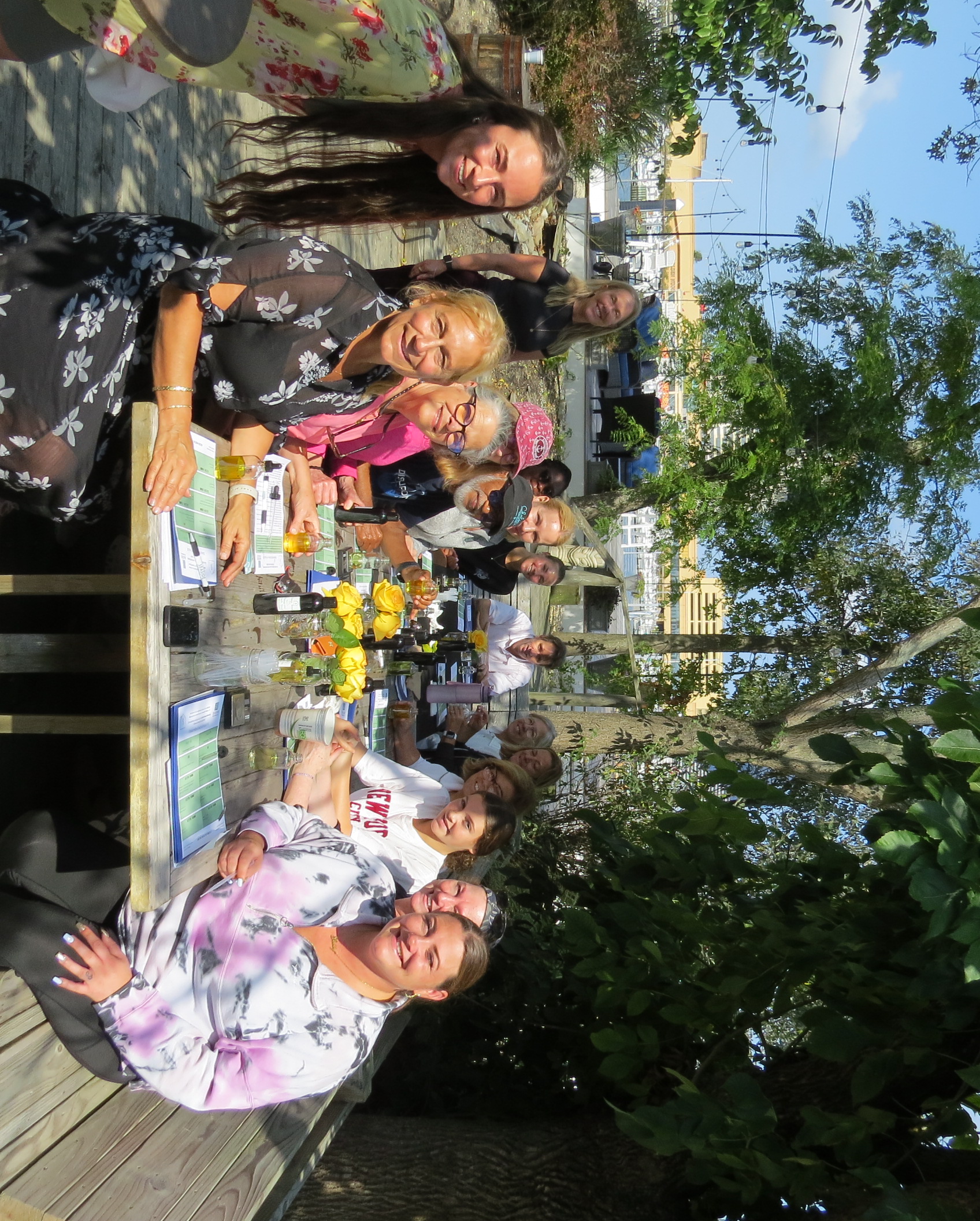 Group gathered at an outdoor wellness event