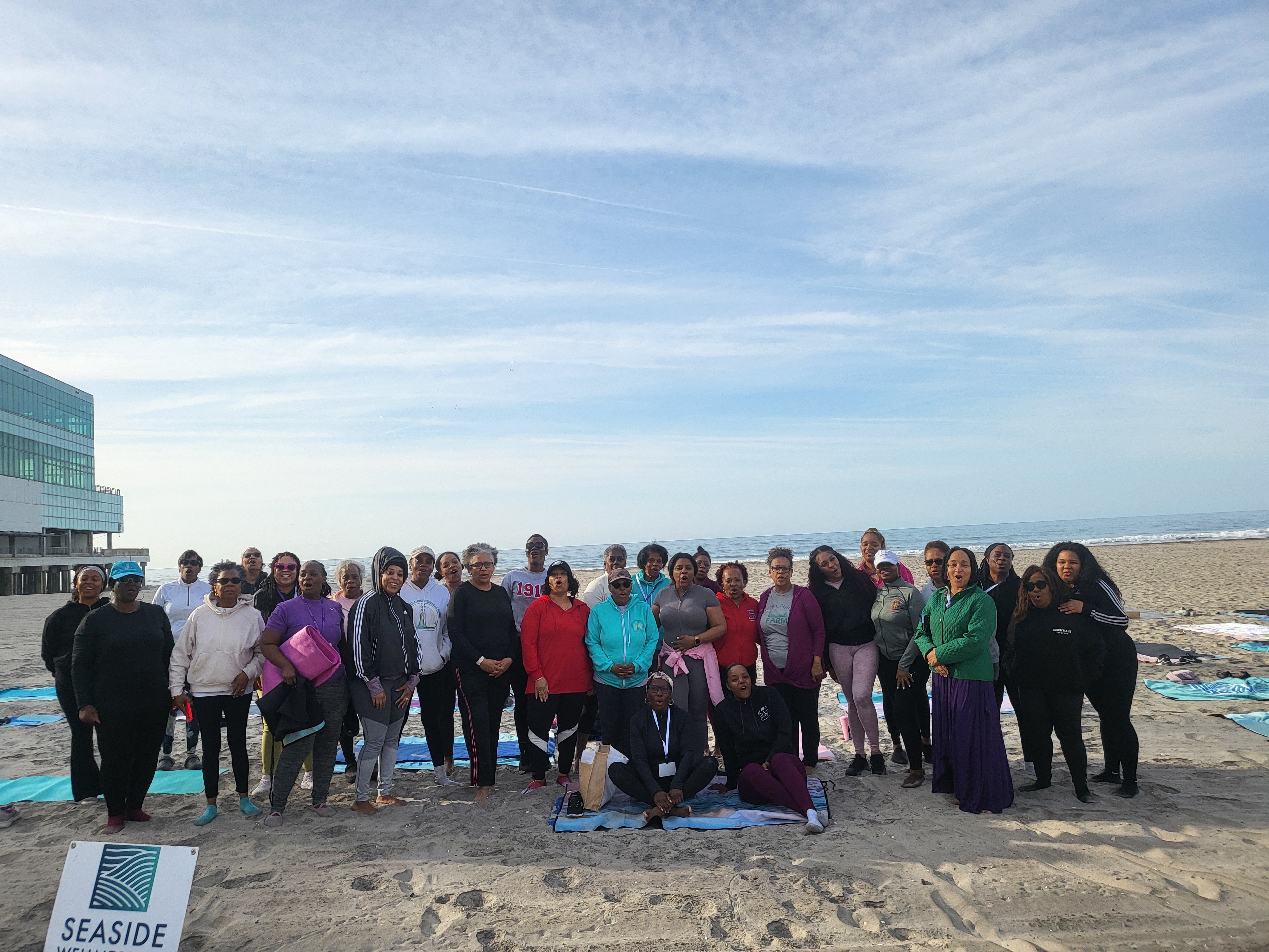 Seaside Wellness AC group on the beach